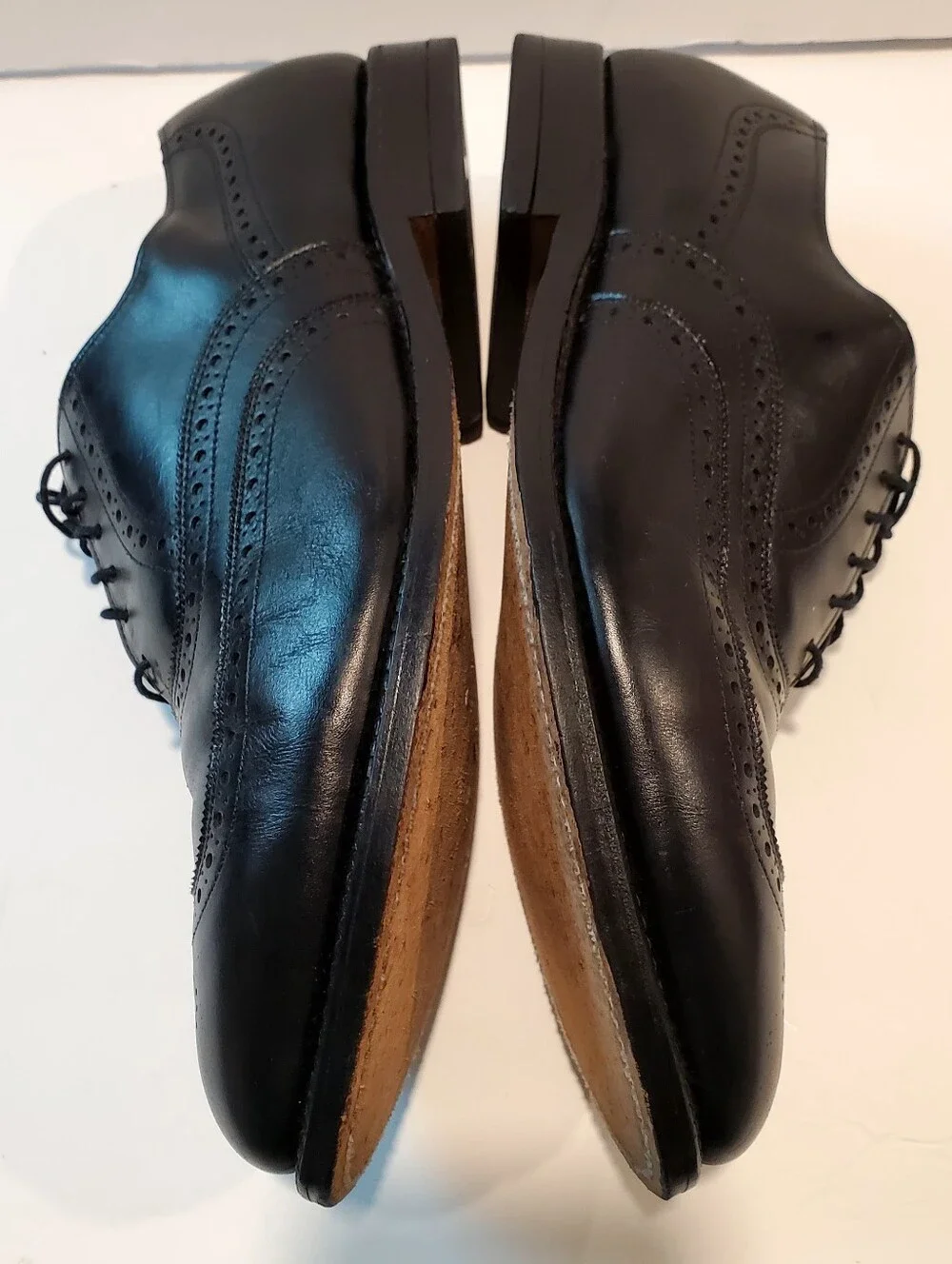 Allen Edmonds fit perforations lines